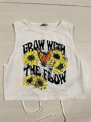 crop geyim: Bershka qadın crop top 
Öıçü M
Arxası açıqdır
1-2 dəfə geyinilib — 1