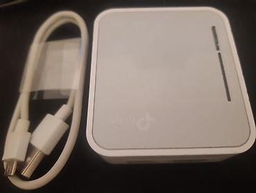 mini wifi router: TP-Link daşınan Wi‑Fi router (travel router) Xüsusiyyətlər: - Kompakt — 1