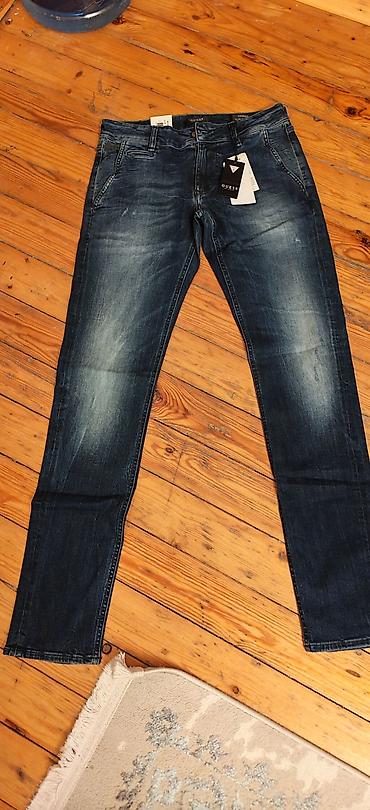 Kişi geyimləri: GUESS Los Angeles kişi cins şalvarı - Model: Ultimate Stretch - Rəng — 1