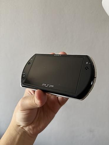 psp memory stick: PSP GO в отличном состоянии, есть пара царапок, в комплекте провод — 1