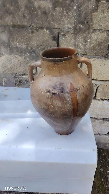 boy guzgulər: Təsvir: - İkiqulplu, enli qarınlı klassik saxsı küp - Material: əl ilə — 1