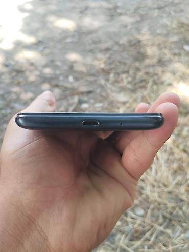 android auto: Смартфон Xiaomi (серия Redmi). Черный корпус, задняя крышка с решеткой — 3