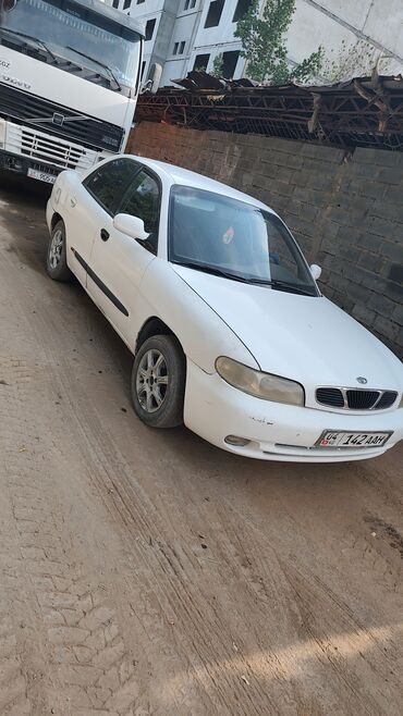 tayota runx: Daihatsu : 1997 г., 1.5 л, Механика, Бензин, Седан