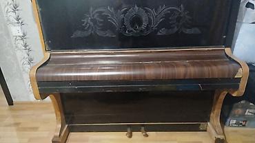 Musiqi alətləri: Məhsul: Şaquli piano Təsvir: - Korpus: klassik şaquli (upright) — 2