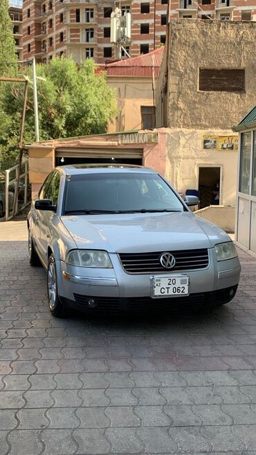 Тарелки: Volkswagen Passat: 1.8 л | 2002 г. Седан
