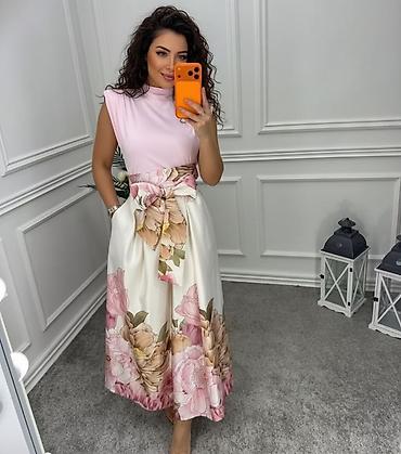chanel baletanke: ✅Midi suknja sa cvetnim dezenom i pojasom na vez
✅2600 din 
S M L — 2