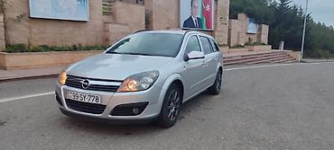 Opel: Opel Astra: 1.6 l | 2005 il Universal — 11