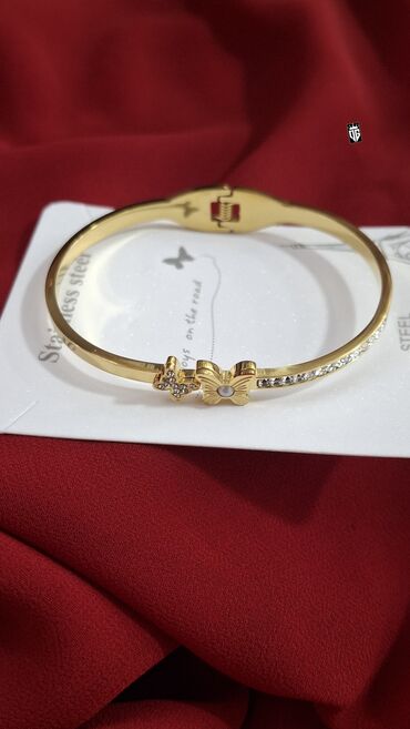 Bilərziklər: Qızılı rəngli, paslanmayan poladdan (STEEL) bəzək bilərziyi. Oval -da lalafo.az — 14 Bilərziklər: Qızılı rəngli, paslanmayan poladdan (STEEL) bəzək bilərziyi. Oval — 14