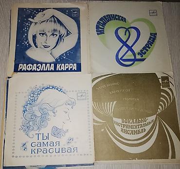 1 dollar satisi: Plastinkalar biri 1 manat — 8