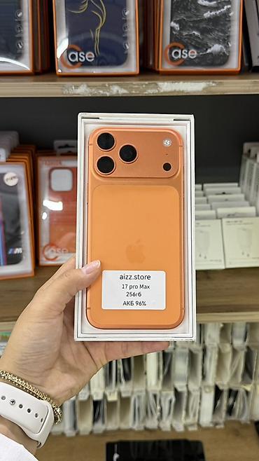 Мобильные телефоны и аксессуары: Смартфон iPhone 17 Pro Max, цвет оранжевый. Объем памяти — 256 ГБ — 4