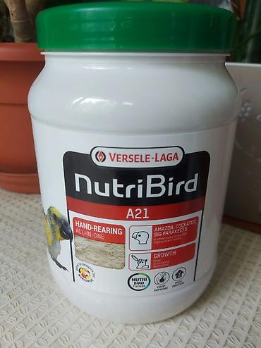 tutuquşu qiymətləri: NutriBird A21 – əl ilə bəslənən quş balaları üçün yem qarışığı — 1