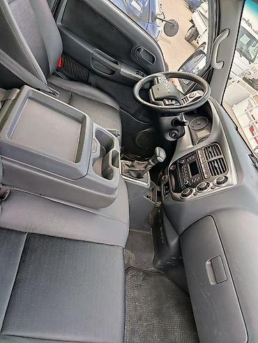 кобит: Kia Bongo III (обновлённый логотип), бортовой малотоннажный грузовик — 4