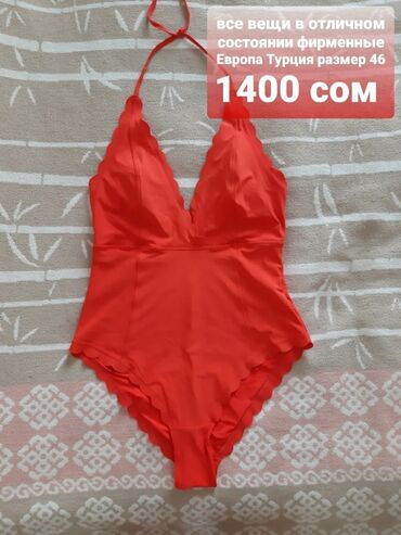 Другая женская одежда: Джинсовый комбинезон синего цвета с классическим дизайном. Модель — 22