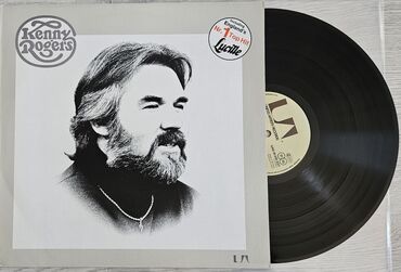 3 dollar nece manatdir: Kenny Rogers, 3 plastinka birlikdə 100 manat. heç bir cızığı zədəsi