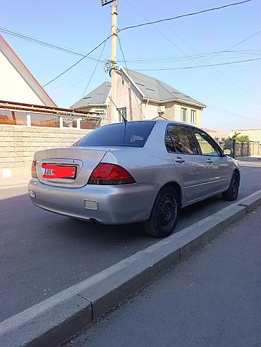 mitsubishi lancer 2006: Mitsubishi Lancer: 2002 г., 1.6 л, Автомат, Газ, Седан — 5