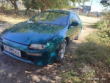 зарядка электровелосипеда: Mazda 323: 1996 г., 1.8 л, Механика, Бензин, Седан — 5
