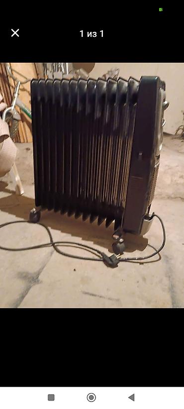 Yağlı radiator tipli elektrik qızdırıcısı - Rəng: qara - Seksiyalı