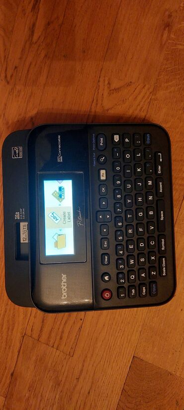 notbuk çantaları: P-Touch D600 stiker printeri. ebay və amazonda qiyməti 140-170