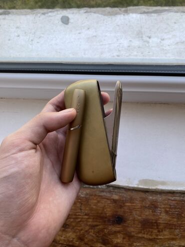 Qəlyan, vayp və aksesuarları: Məhsul: IQOS elektron tütün qızdırma cihazı (qızılı rəng) Təsvir: -