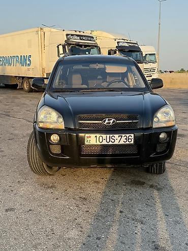 islenmis hyundai avtomobilleri satisi: Hyundai Tucson, qara rəng, Azərbaycan nömrə nişanı 10-US-736 — 1