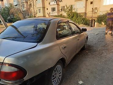 Транспорт: Mazda 323: 1997 г., 1.6 л, Автомат, Бензин — 3