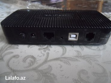 Modemlər və şəbəkə avadanlıqları: Modem ağ- dial up (1 portlu)-5 manato biri qara (tp-lİnk)-1portlu-10 — 2