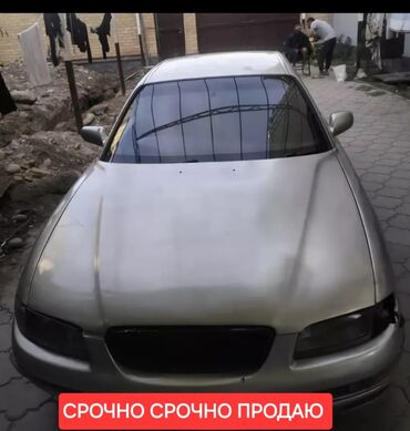 mazda tribut: Mazda Millenia: 1997 г., 2.5 л, Автомат, Бензин, Седан