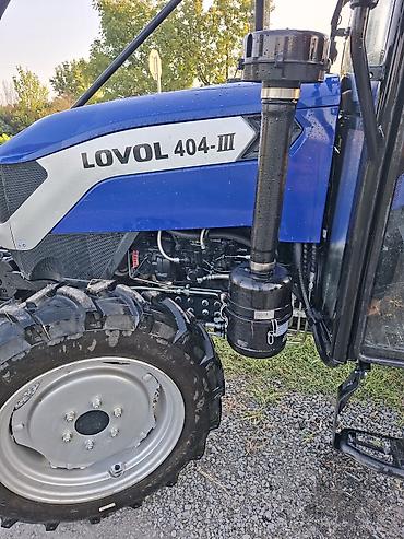 Traktorlar: Lovol 404-III traktor - Güclü və qənaətcil dörd silindrli dizel — 2