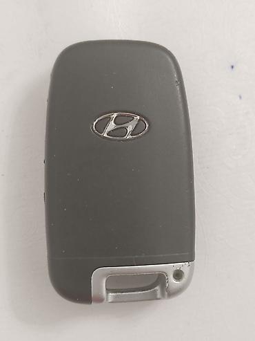 изготовления ключей: Смарт-ключ Hyundai с выкидным металлическим жалом. Брелок выполнен в — 2