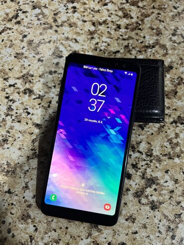 Samsung Galaxy A8 2018 | İşlənmiş | 64 GB | rəng - Qara | Sensor, Barmaq izi, İki sim kartlı