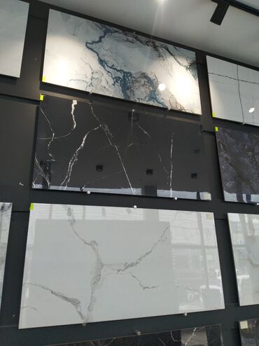 qiz otagi ucun oboylar: Mərmər naxışlı, müxtəlif rənglərdə böyük ölçülü keramik plitələr. Bu