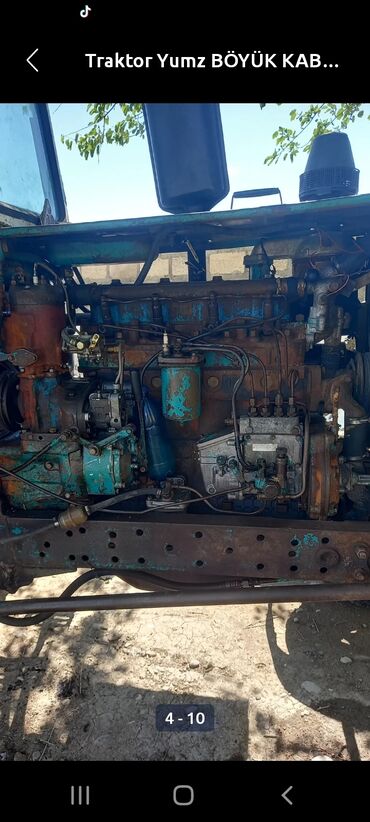 Traktorlar: YUMZ traktor – böyük kabinalı model Xüsusiyyətlər: - Dizel mühərrik — 12