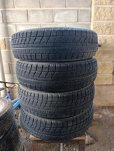 колеса 21565 r16: Комплект зимних шин Bridgestone Blizzak VRX - Размер: 155/65 R14 - — 2