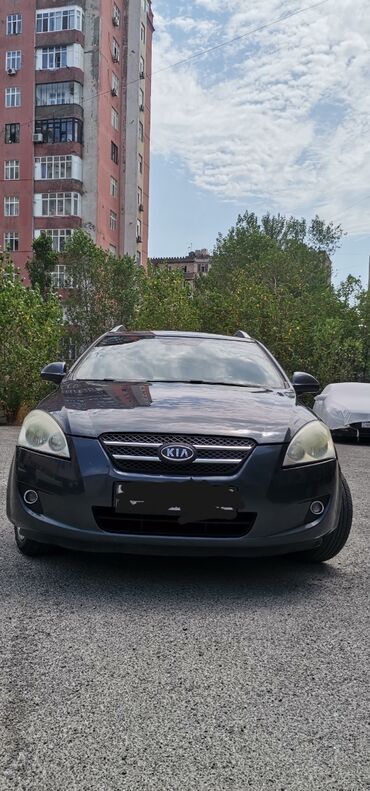 Kia Ceed: 1.6 л | 2008 г. Универсал