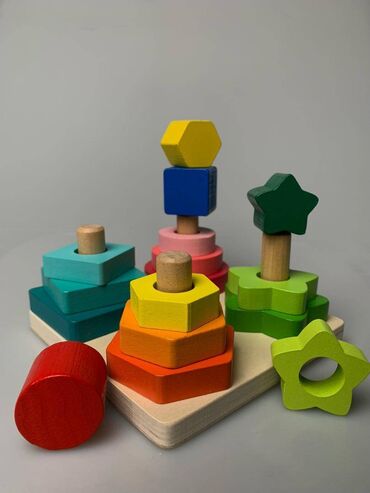 детские игрушки деревянные: Такая развивающая игрушка поможет развить Вашему малышу моторику рук