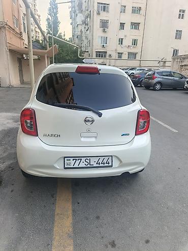 kuzu: Nissan Micra – şəhər üçün kompakt və qənaətcil hetçbek. - Kuzov: ağ — 9