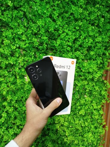 Xiaomi: Xiaomi Redmi 12, 128 GB, rəng - Qara, 
 Zəmanət, Barmaq izi, İki sim kartlı