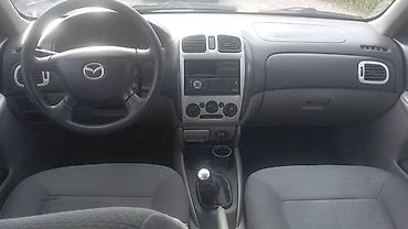 кузов евро: Mazda 323: 2002 г., 1.6 л, Механика, Бензин, Хэтчбэк — 8