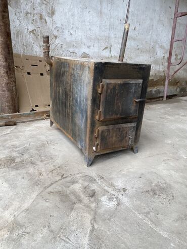 садовые тележки: Стальная дровяная печь-«буржуйка» с варочной поверхностью Описание: -