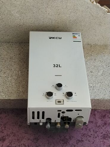 бу аккумулятор: KCU markalı ağ rəngli qızdırıcı, 32 litr tutumlu. Bu model suyun