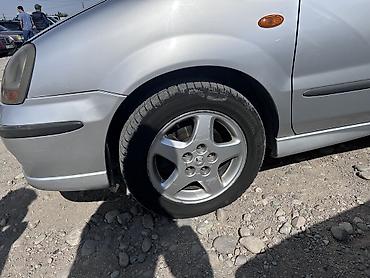 тсунами снм 200: Nissan Almera Tino: 2003 г., Механика, Бензин — 3