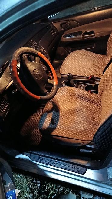 митсубиси спейс стар: Mitsubishi Lancer: 2006 г., Седан — 5