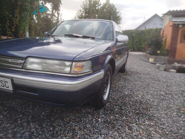 электронный скутр: Mazda 626: 1989 г., 2 л, Механика, Бензин, Седан