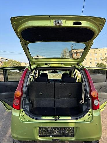 Daihatsu Cuore: 2008 г., 1 л, Механика, Бензин, Хэтчбэк — 10
