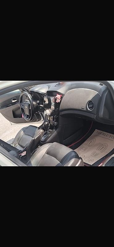 opel astra k: Chevrolet Cruze sedan – ağ rəng, 5 yerlik, ön çəkişli. Texniki və — 6