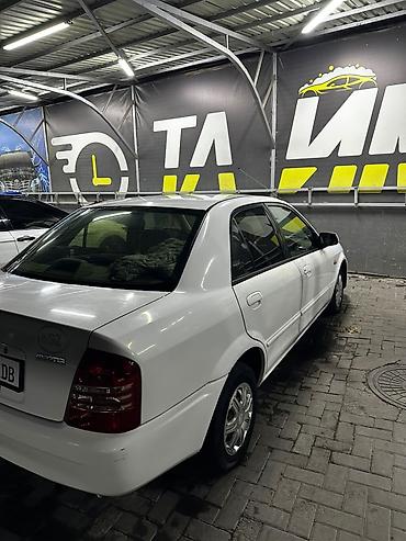 Mazda: Mazda Familia: 2002 г., 1.5 л, Автомат, Бензин — 2