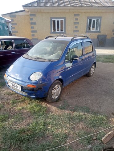 как можно купить машину в рассрочку: Компактный городской автомобиль Daewoo Matiz синего цвета, оснащенный