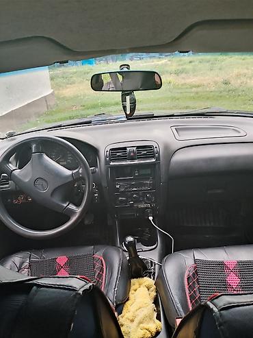 smart plus: Mazda 626: 1997 г., 1.8 л, Механика, Седан — 8