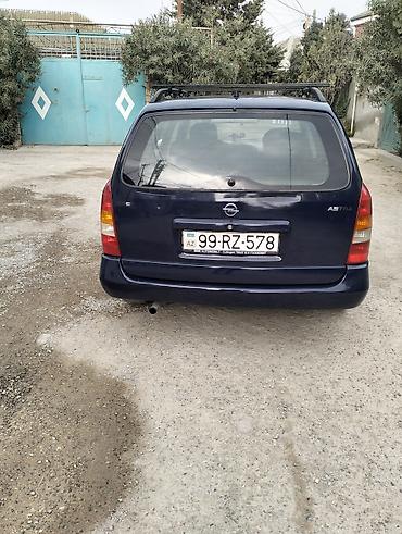 prius baqaj: Opel Astra Caravan (universal) – tünd mavi rəng. Xüsusiyyətlər: - — 6