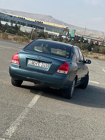 karopkalar: Hyundai Elantra: 2 l | 2003 il Sedan — 7
